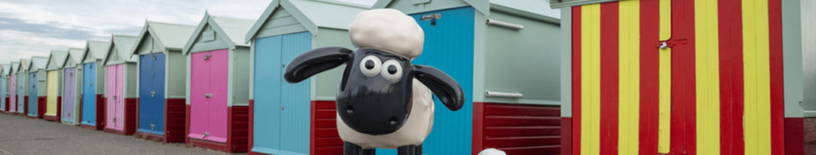Shaun the Sheep in front of the Brighton Huts
