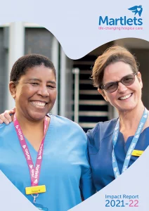 impact report front cover which has two women in scrubs smiling. 