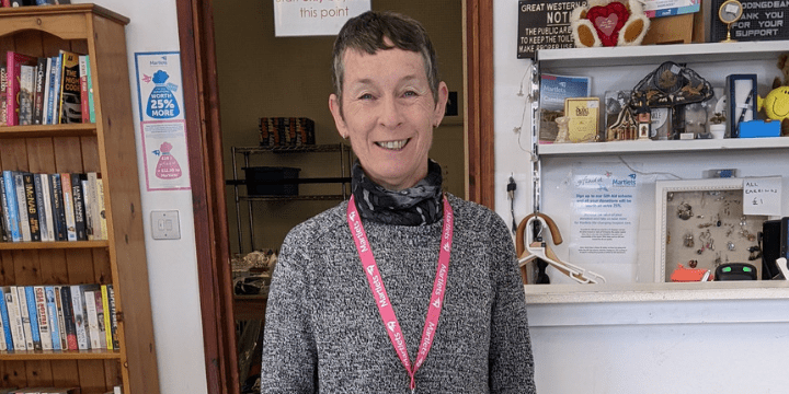 Bev, volunteer at Woodingdean - mannequins and bow ties