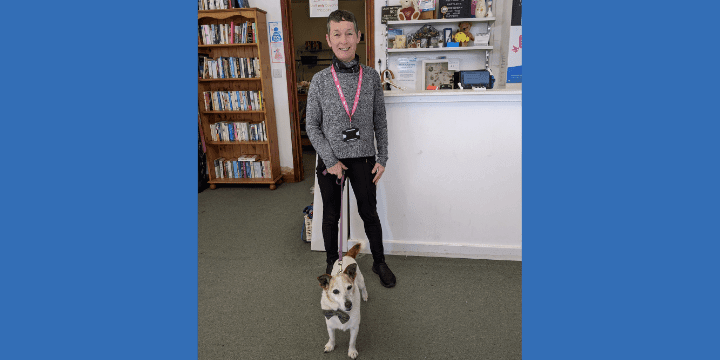 Beverly volunteer with the dog in our Woodingdean shop