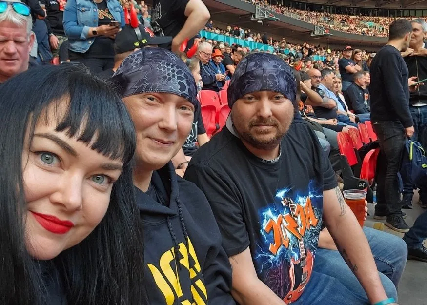 Marie, Dan and Carl at an ACDC concert