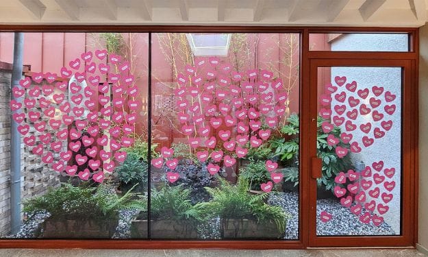 heart shaped stickers on the windows in Martlets
